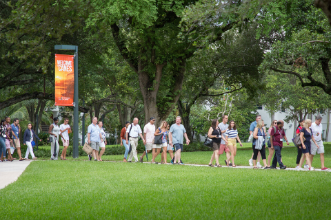 Photo of students and families on campus